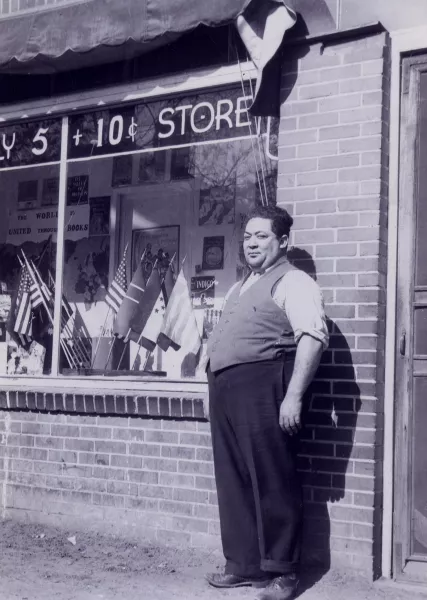 George Elmore poses outside the Waverly 5 and 10 Store