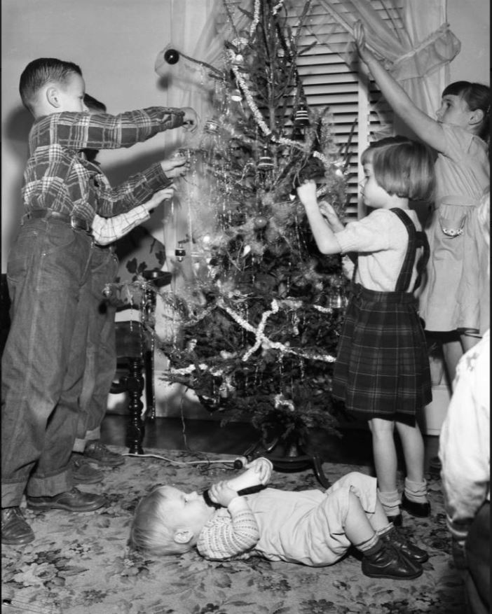 Gross family decorating tree