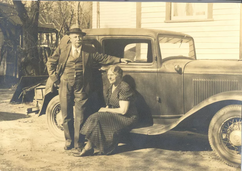 Pictured here are Braxton Bragg "B.B" Davis and his wife Ada of 2726 Preston Street posing beside their car