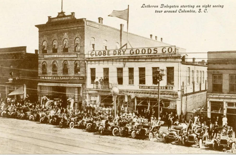 Postcard of Lutheran Publication Building and Globe Dry Goods Company store, ca. 1910.